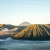 Landscape view of Mount Bromo crater and Mount Semeru volcano in East Java, Indonesia, during sunrise.