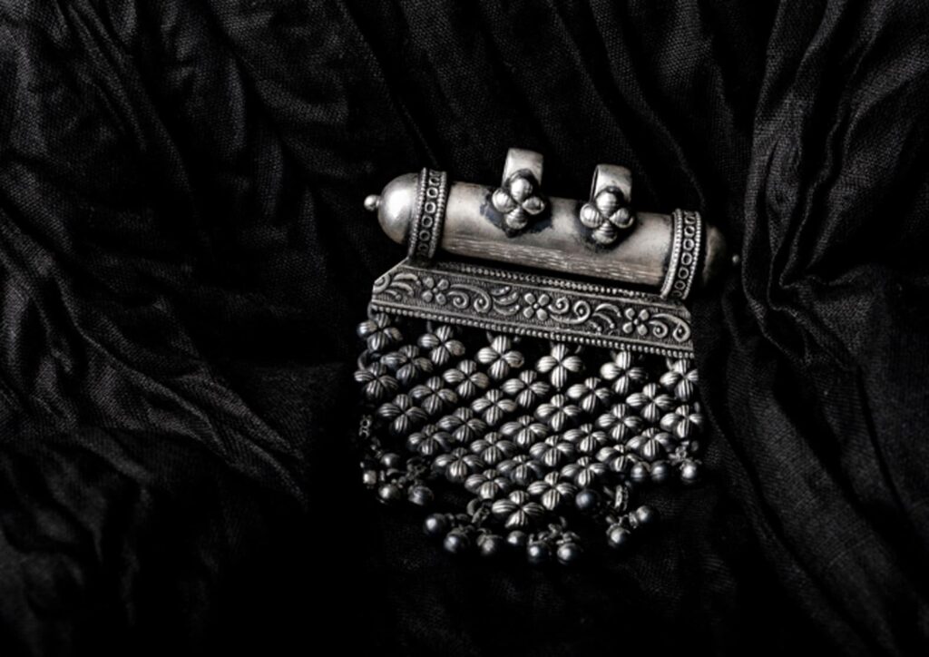 Traditional Bali silver jewelry with detailed engraving and unique design