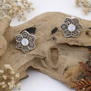 Close-up of spiritual mandala earrings in boho style