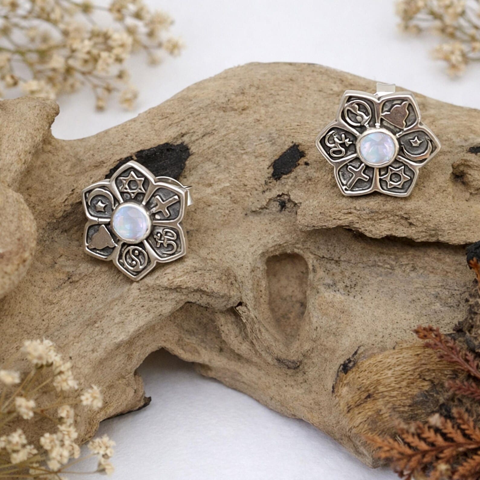 handmade-silver-mandala-earrings-packaging.jpg Close-up of spiritual mandala earrings in boho style