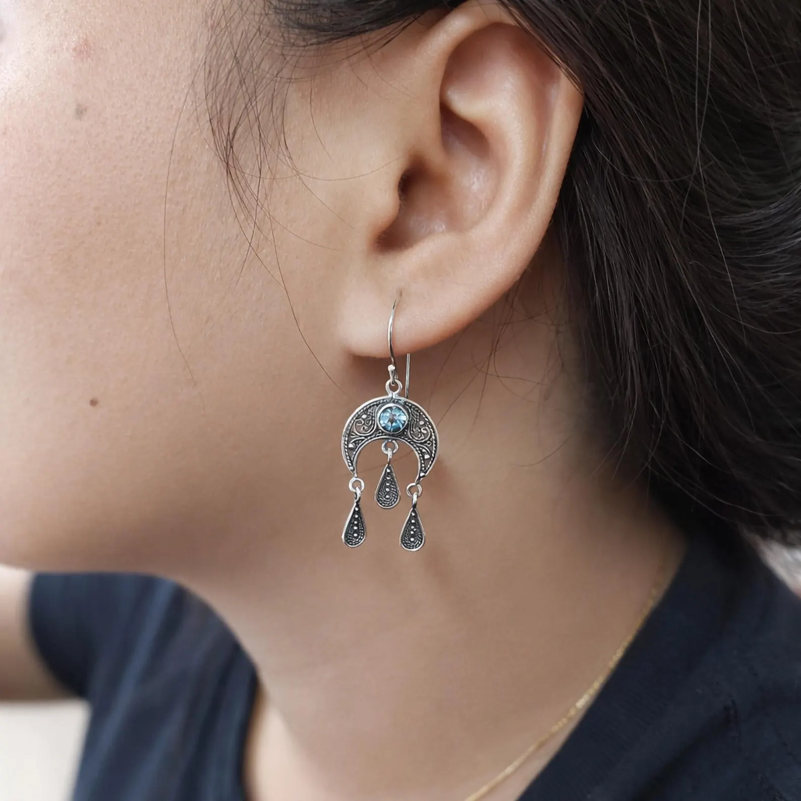 Handmade Silver Crescent Moon Earrings on Model Minimalist lunar earrings with bohemian design