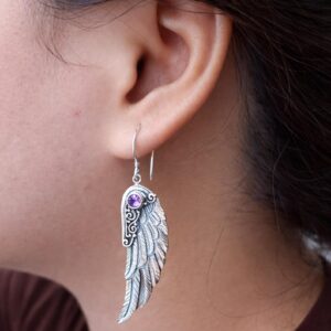 Boho symbolic wing earrings with spiritual meaning