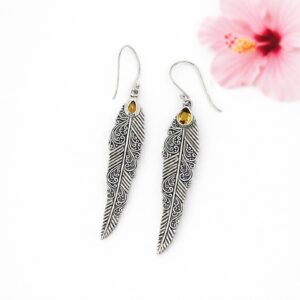 Lightweight handmade silver feather earrings with artisan design