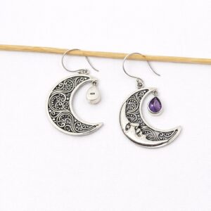 Boho celestial earrings with expressive moon face design