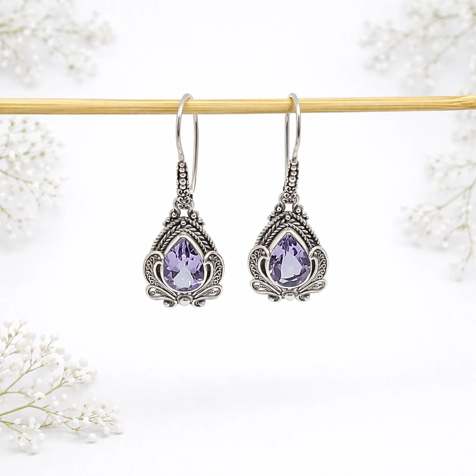 Handmade Silver Earrings Side View Close-up of elegant gemstone drop earrings in sterling silver