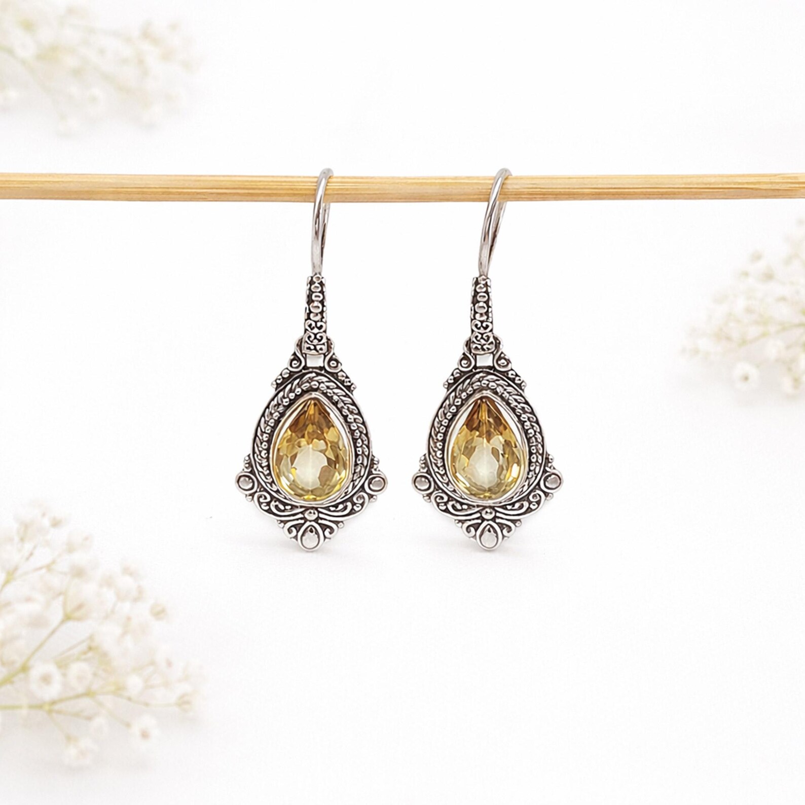 Boho Teardrop Earrings Side View Close-up of elegant gemstone teardrop earrings in sterling silver