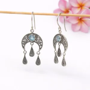Handmade sterling silver crescent moon earrings inspired by celestial energy