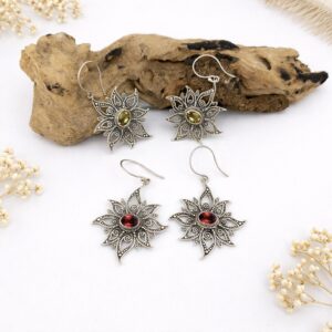Elegant celestial sun earrings crafted in sterling silver