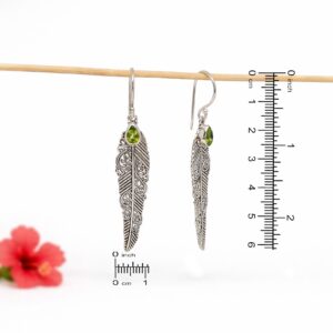 Elegant nature inspired feather drop earrings for women