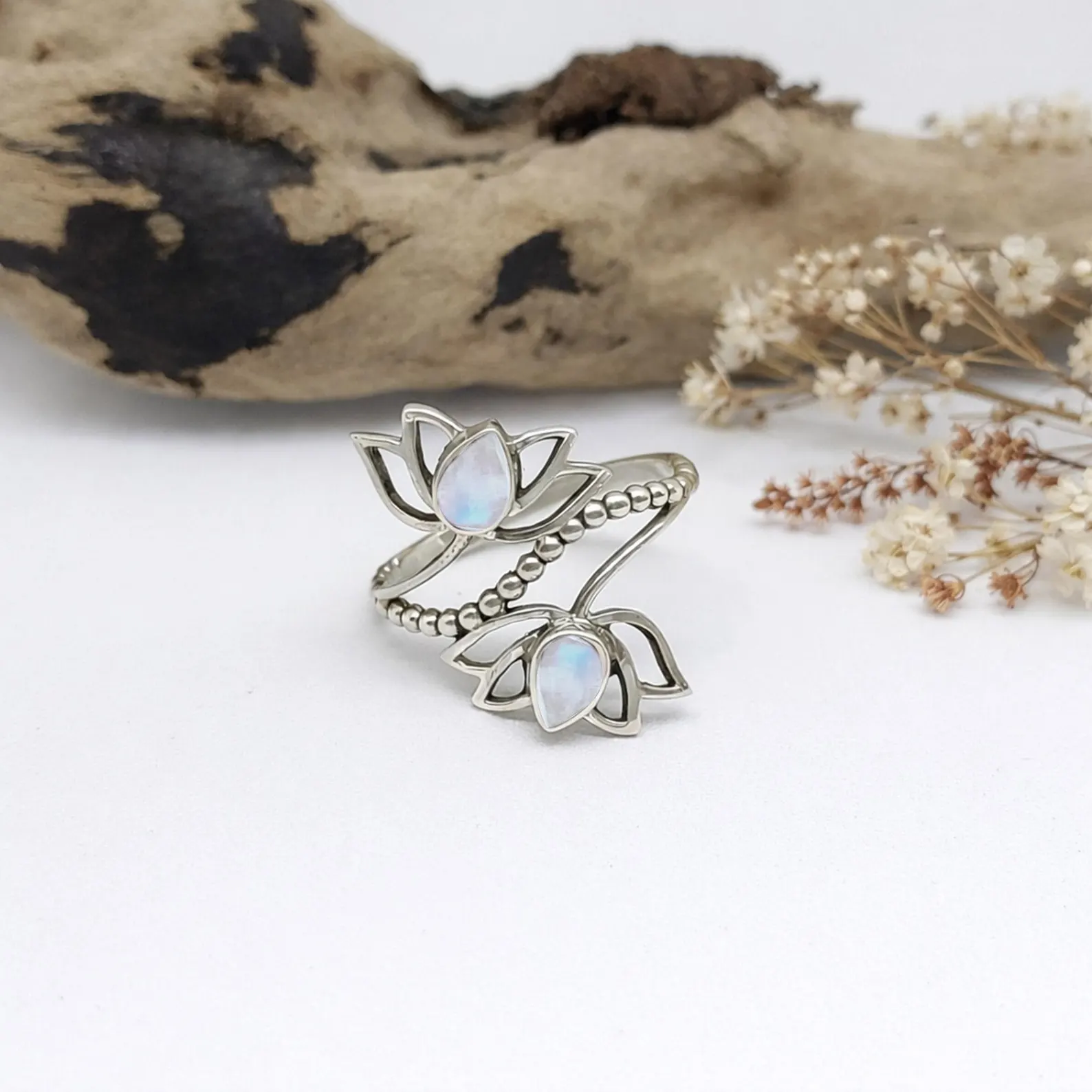 Sterling Silver Lotus Flower Ring Hero Shot Artisan crafted lotus silver ring symbolic nature inspired jewelry
