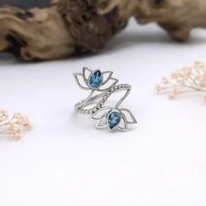 Detailed floral lotus engraving sterling silver ring macro shot