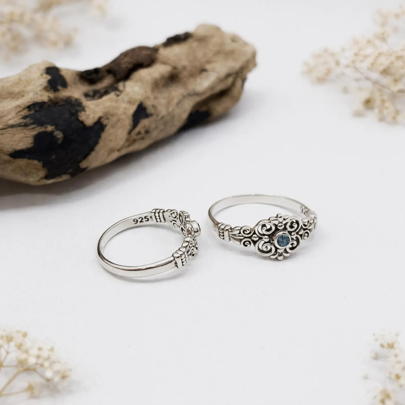 Sterling Silver Filigree Ring Hero Shot Flat lay of intricate sterling silver filigree ring minimalist styling