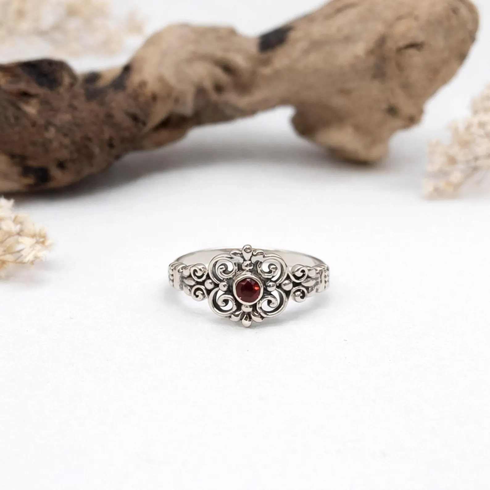 Elegant Filigree Sterling Silver Ring Flat Lay Photo Intricate openwork sterling silver ring handcrafted Bali artisan jewelry