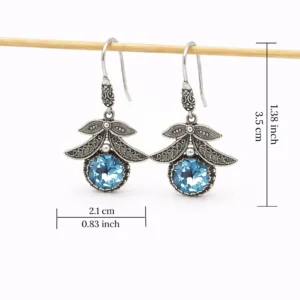 Elegant handmade leaf earrings with botanical pattern