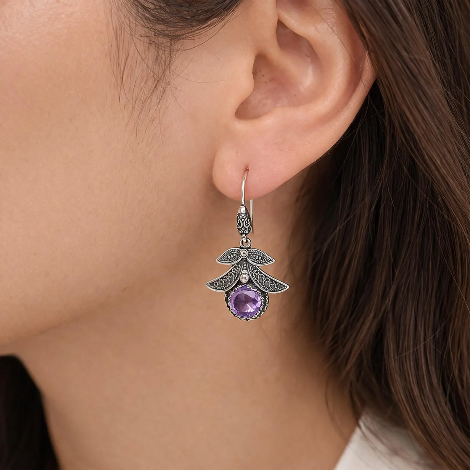 il_1588xN.7917251491_lzw6 Close-up of detailed silver leaf earrings with natural design