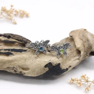 Detailed butterfly motif silver ring macro jewelry shot
