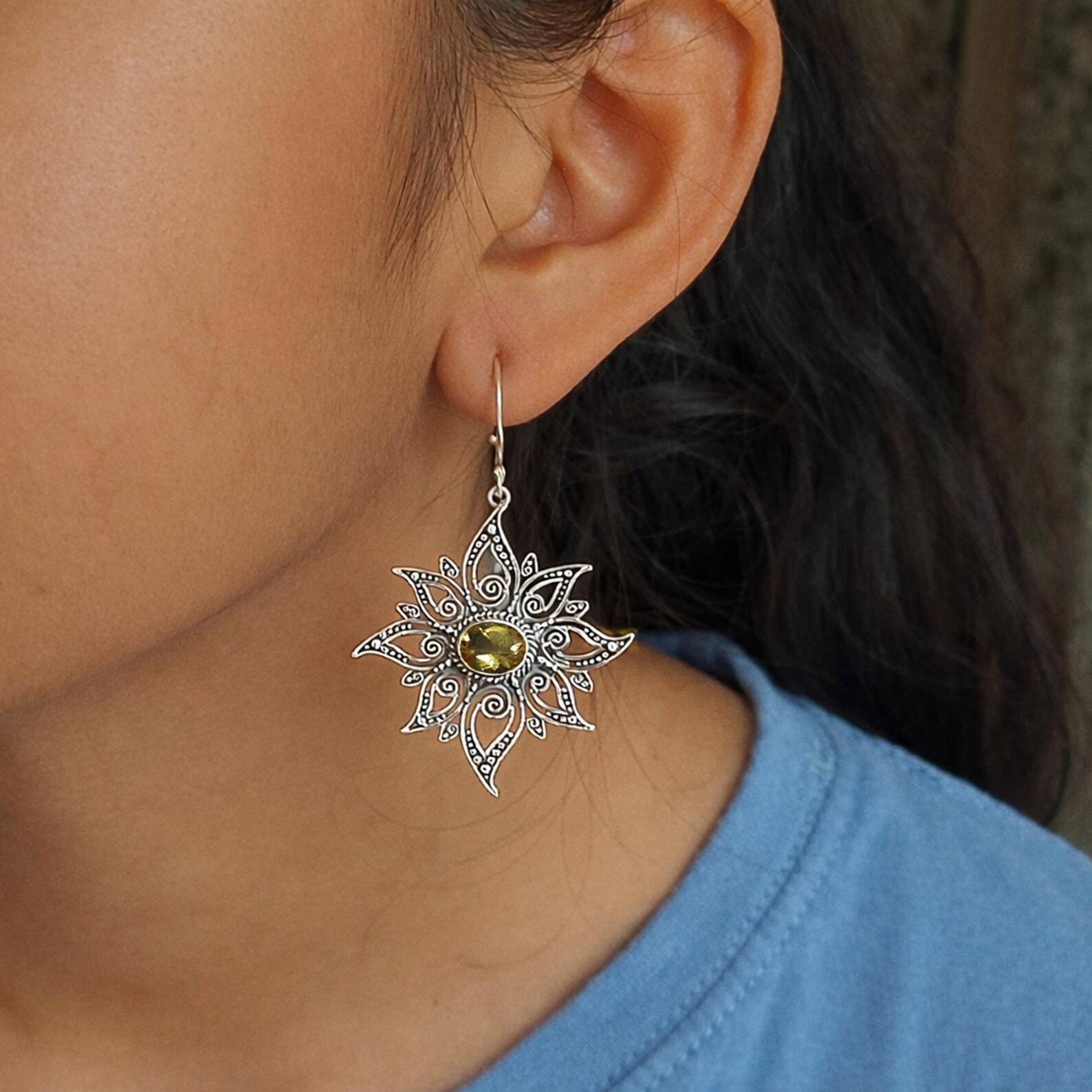 Minimal Sun Earrings Side View Handmade sterling silver celestial sun earrings inspired by solar energy