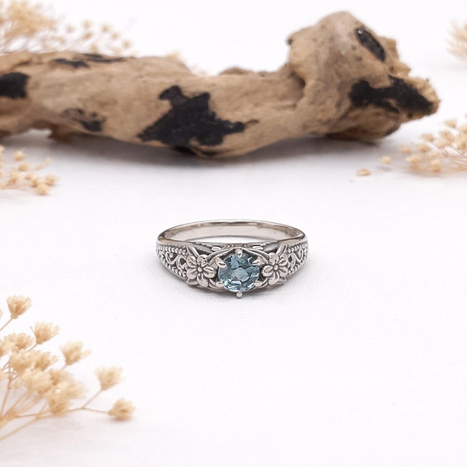 Sterling Silver Frangipani Ring Studio Light Macro Boho floral ring styled outdoors natural light aesthetic photo