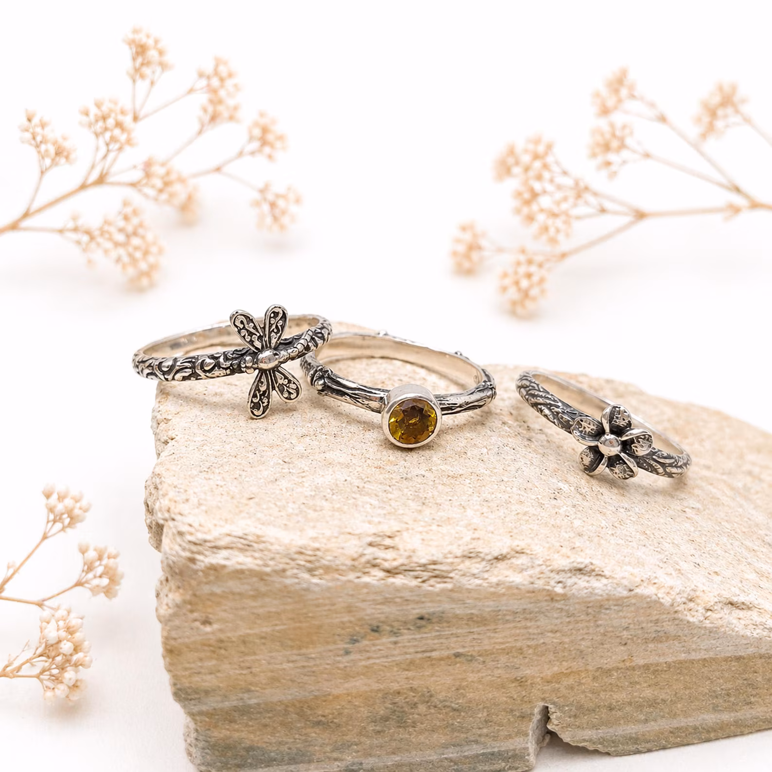Handmade Bali Silver Stackable Rings On Hand Lifestyle Premium artisan Bali silver rings symbolic nature jewelry set