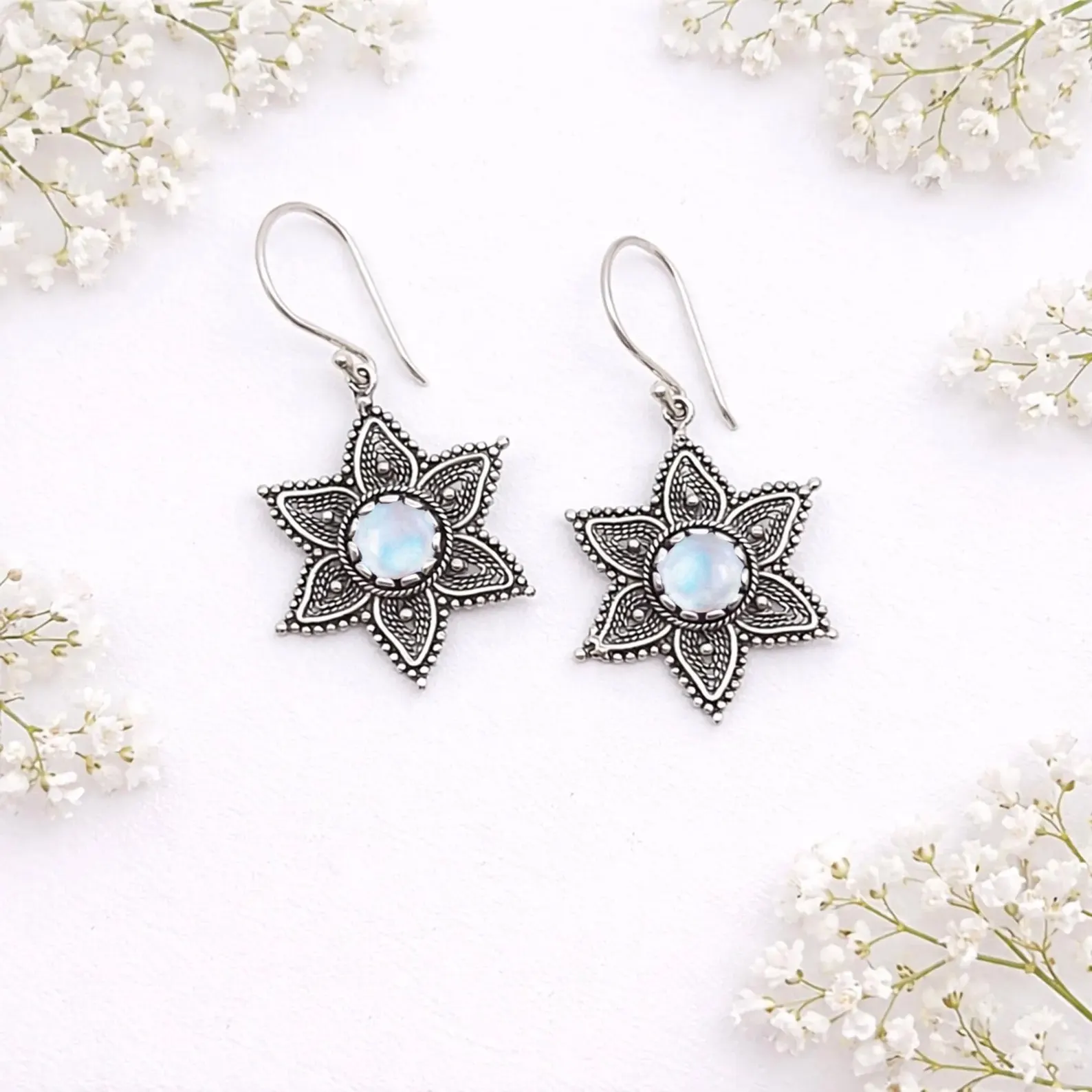 Handmade Bali Flower Earrings Side View Elegant boho flower earrings handcrafted in sterling silver
