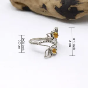 Close-up macro detail of lotus flower sterling silver artisan ring