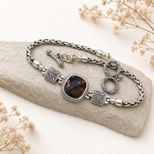 Close-up of soft square chain bracelet detail in sterling silver