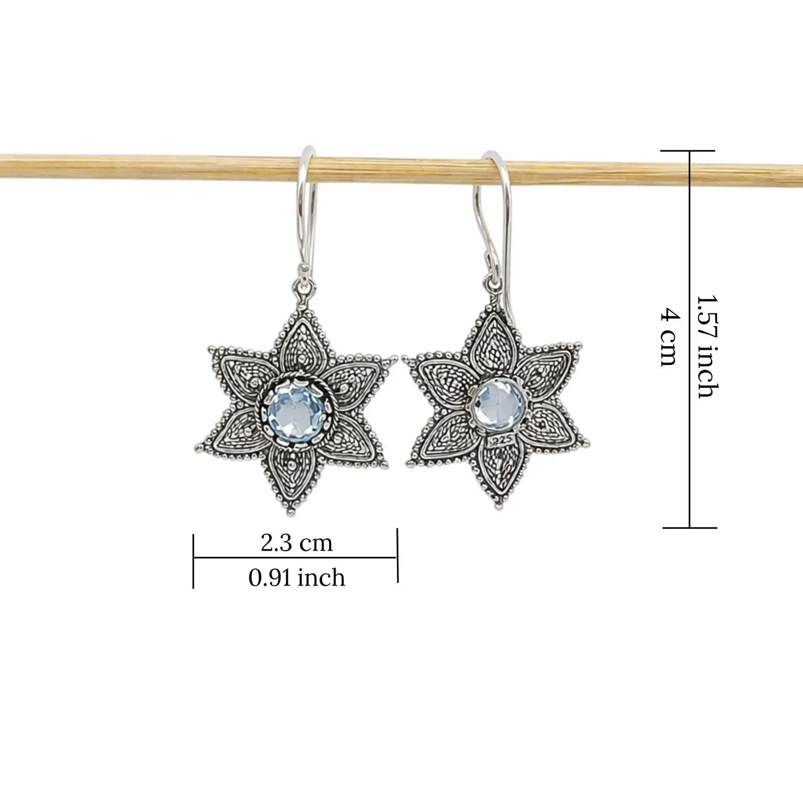 Boho Floral Silver Earrings on Model Close-up of detailed floral filigree silver earrings