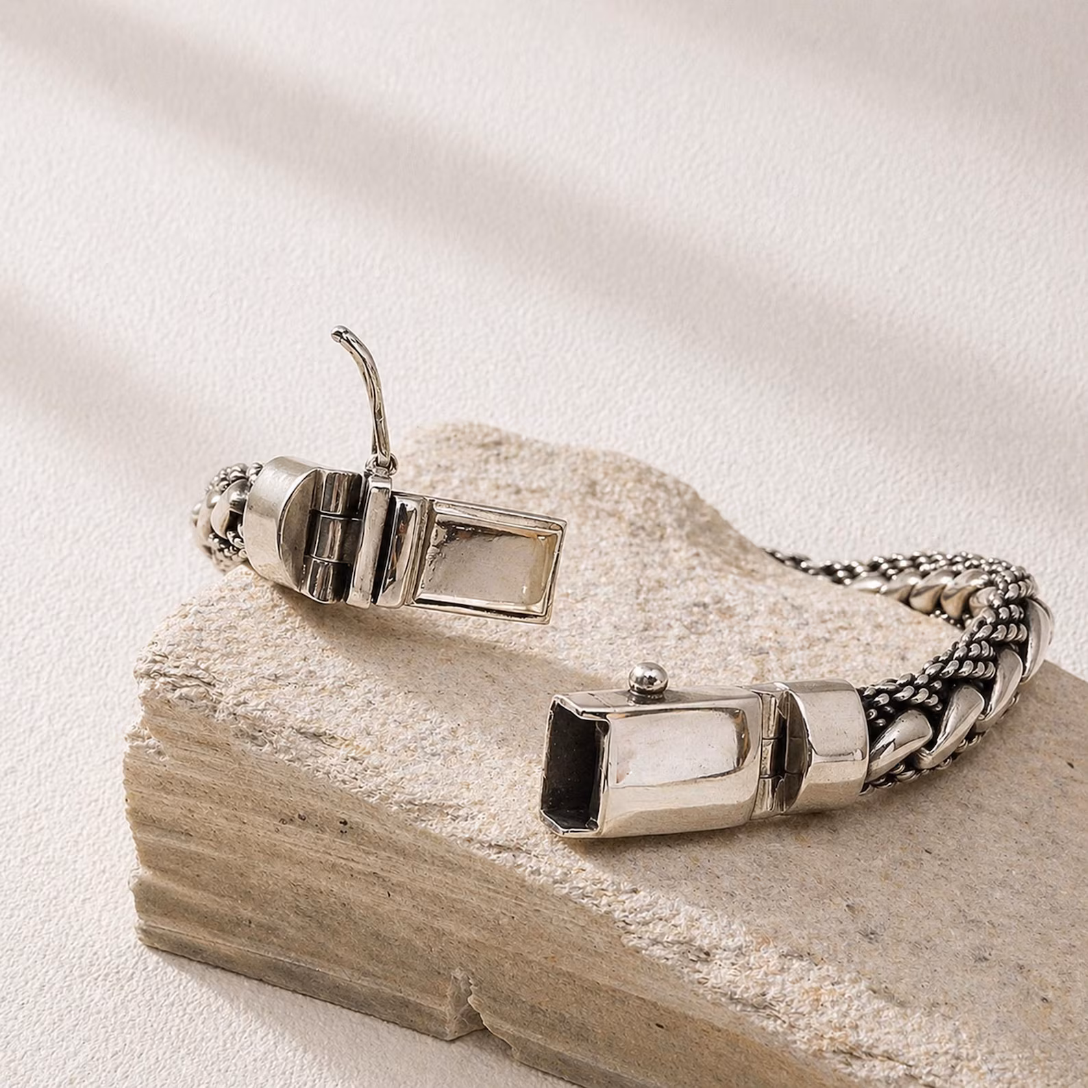 Wide Silver Bracelet on Wrist Sterling silver bracelet clasp detail close-up shot