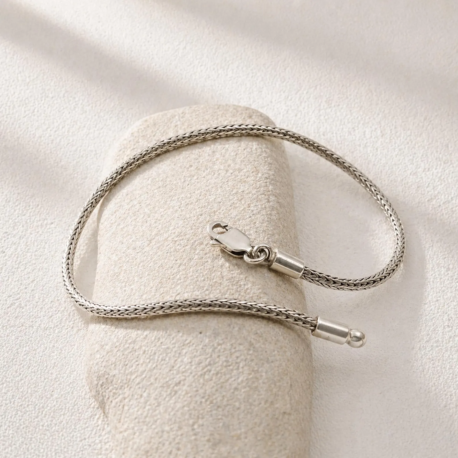 2mm Sterling Silver Woven Bracelet Front View1 Sterling silver bracelet clasp detail close-up shot