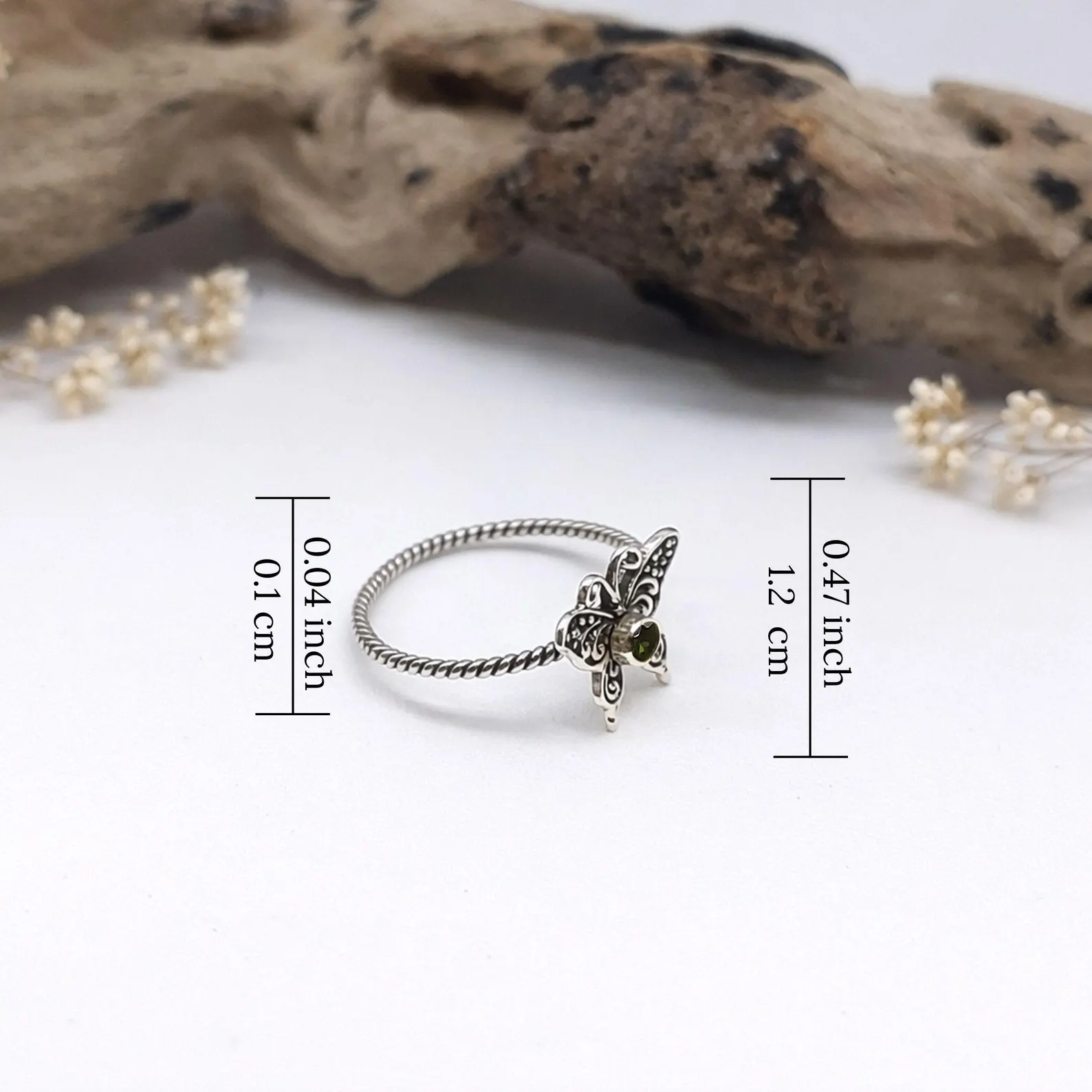 Elegant Butterfly Statement Ring Flat Lay Statement sterling silver butterfly ring for women close-up view
