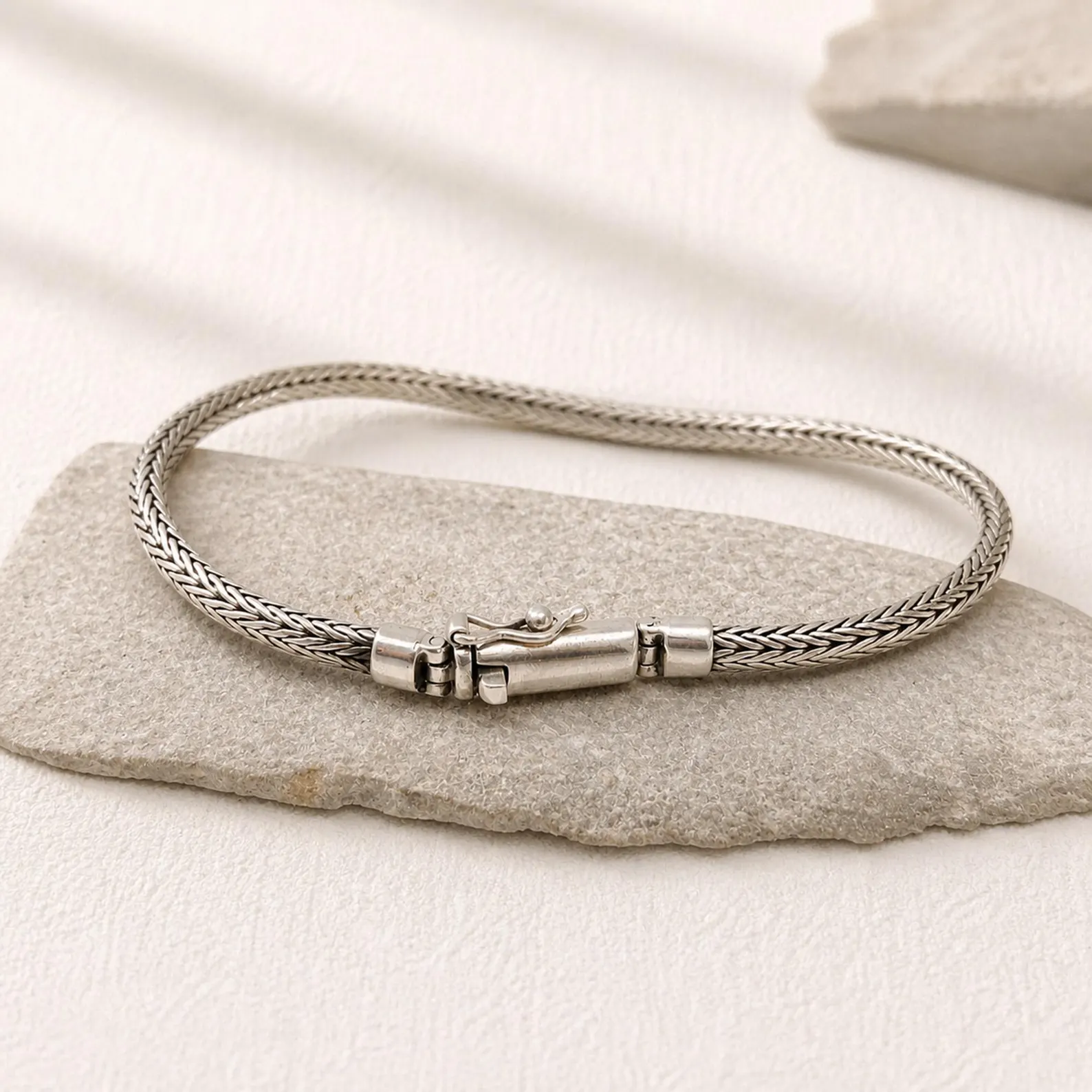 Woven Silver Bracelet Studio Shot1 Tulang style silver bracelet worn on wrist