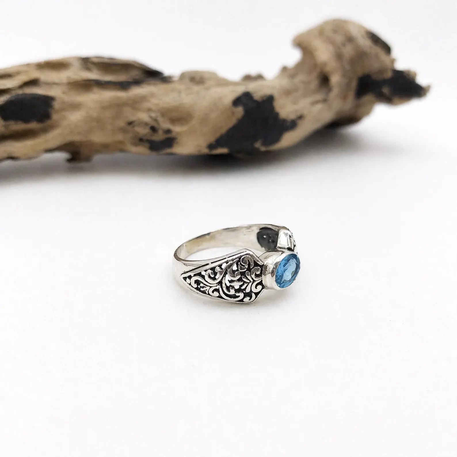 Nature Inspired Engraved Ring Jewelry Styling Flat lay of minimalist floral sterling silver ring premium styling