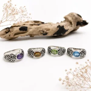 Artisan crafted sterling silver ring with nature inspired pattern