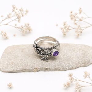 Stackable silver rings worn on hand in elegant bohemian style