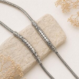 Elegant woven chain bracelet worn on wrist