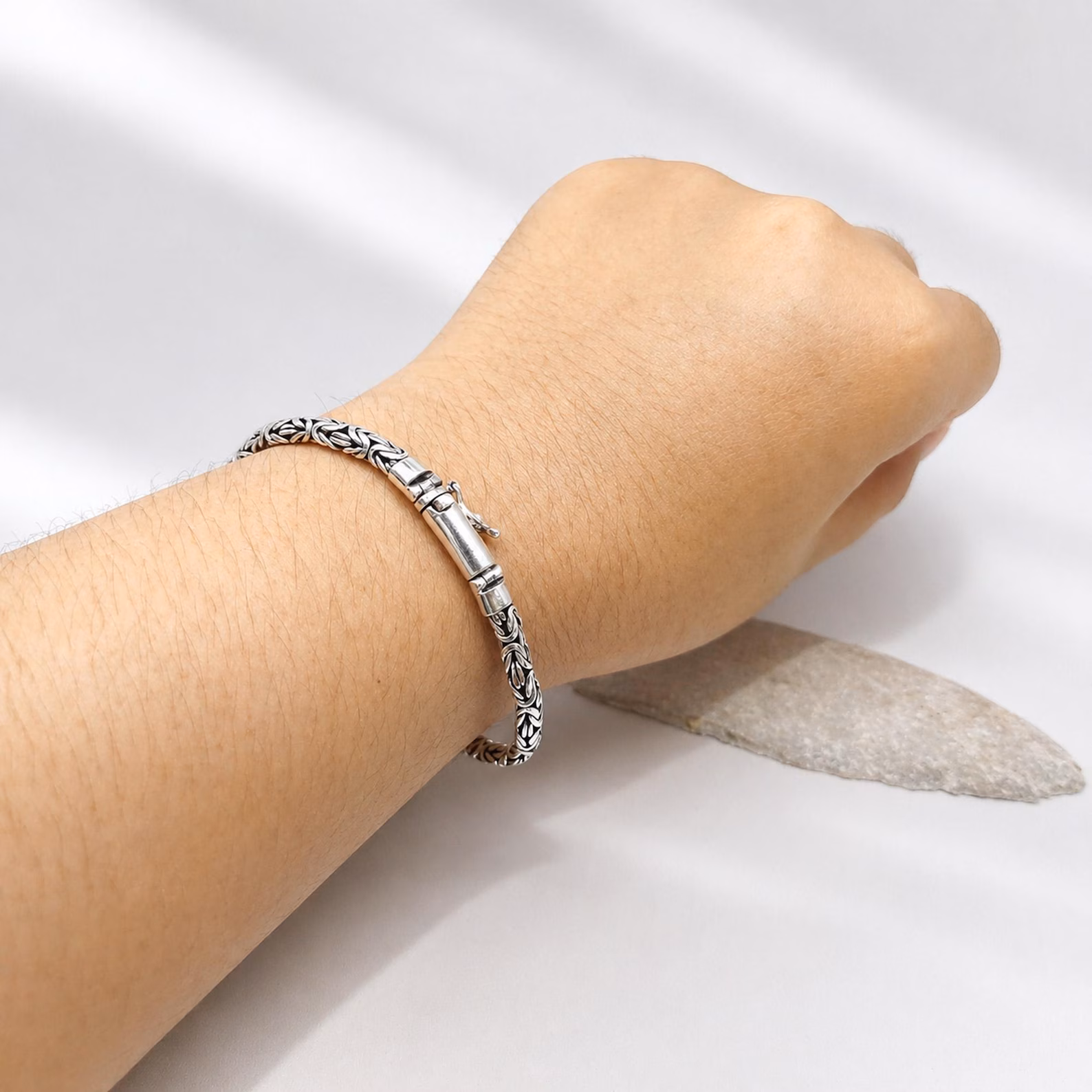 925 Byzantine Bracelet Studio Shot Bold woven silver bracelet worn on wrist