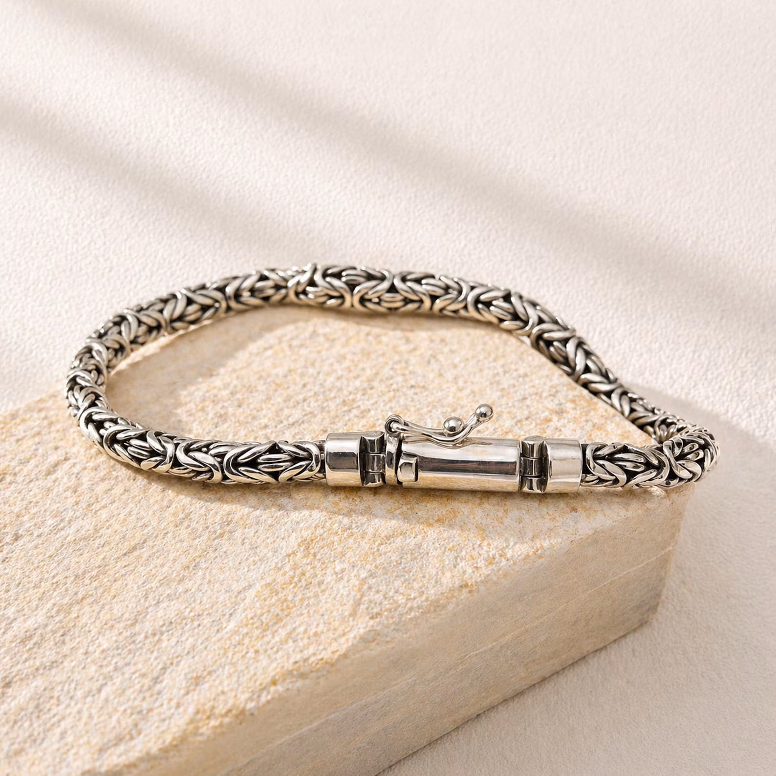 Intricate Chain Bracelet Side View Sterling silver Byzantine bracelet with artisan design