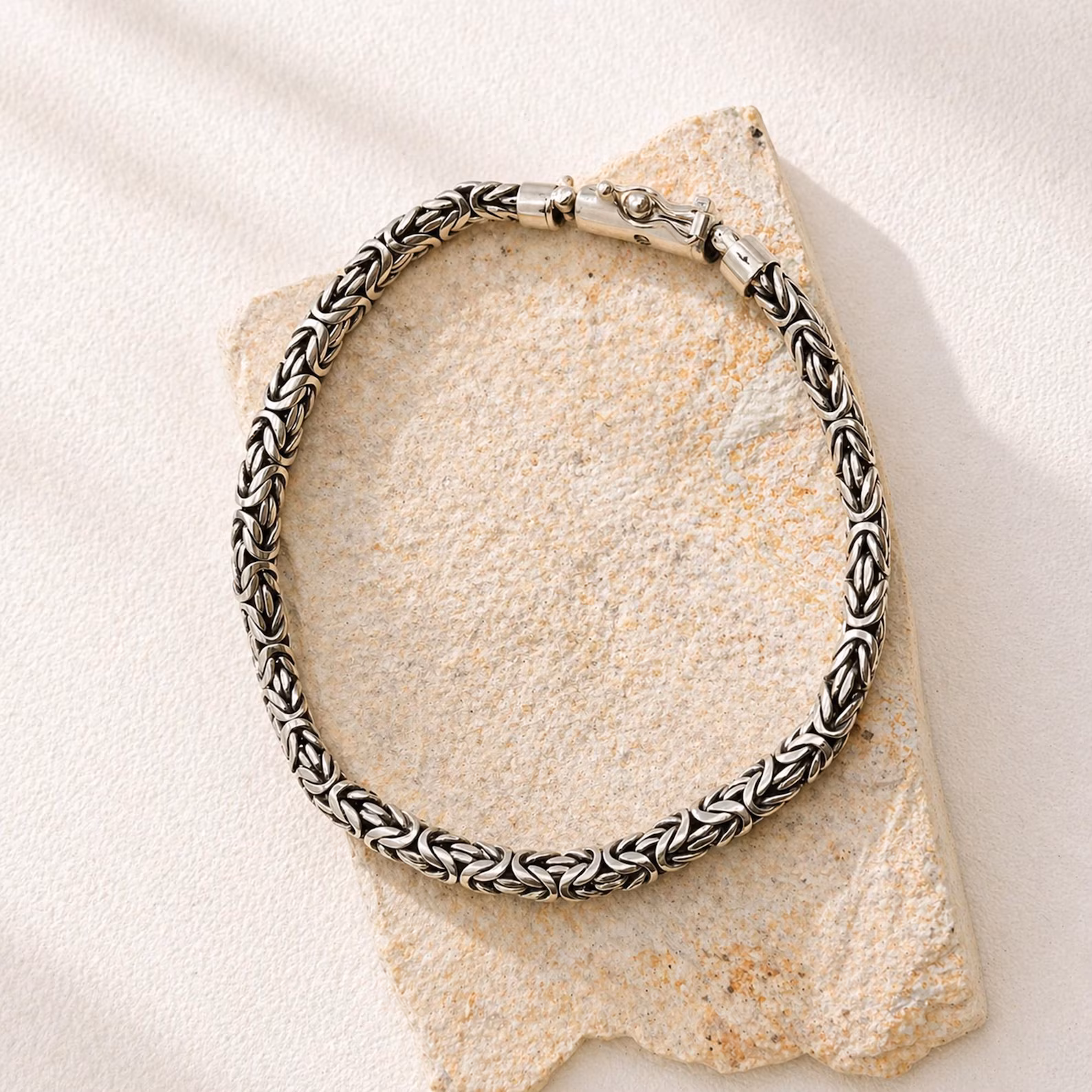 Bold Woven Silver Bracelet on Wrist1