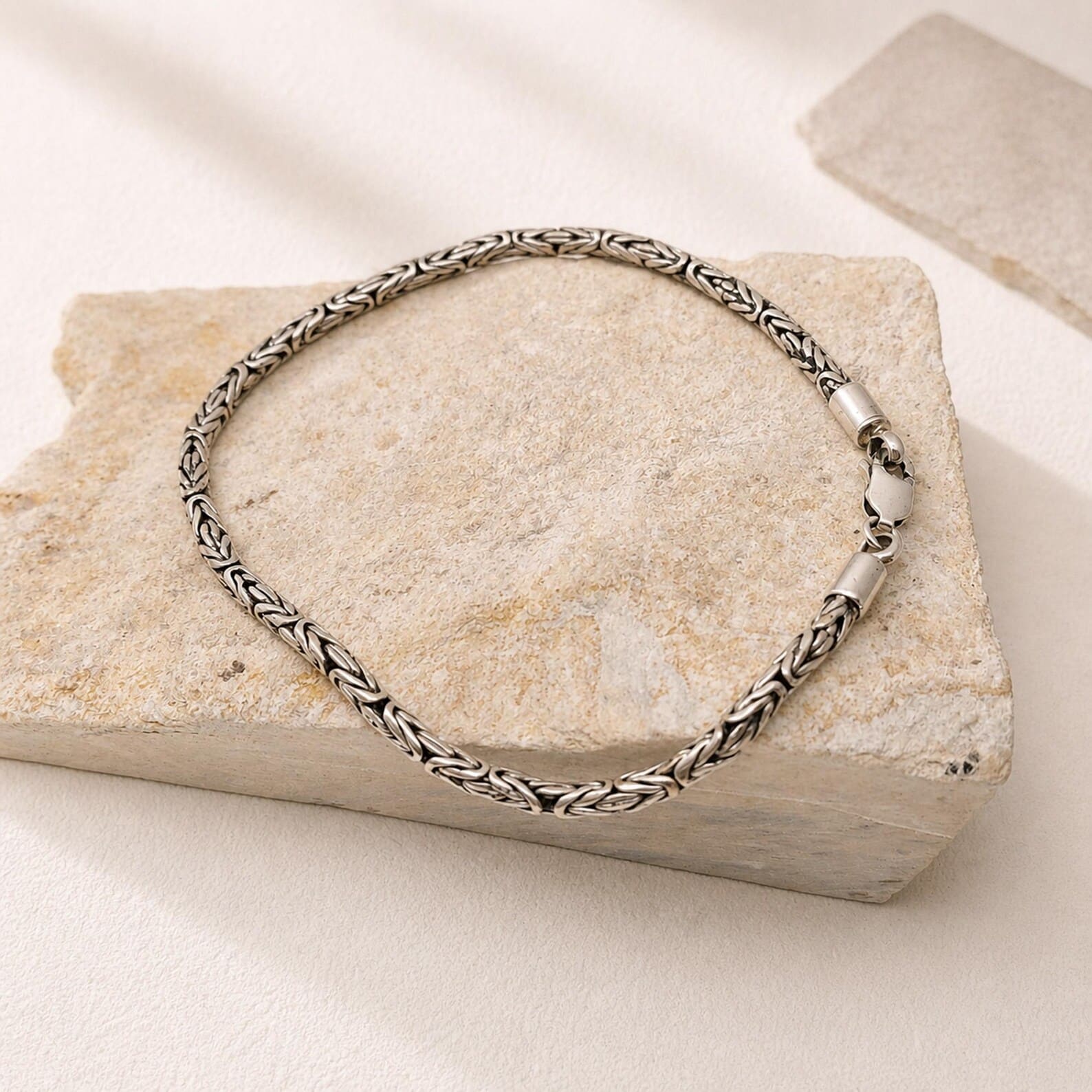 3mm Silver Chain Bracelet Studio Shot Elegant 3mm chain bracelet with intricate woven design