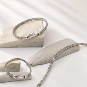 Flat lay of 925 sterling silver herringbone bracelet for women