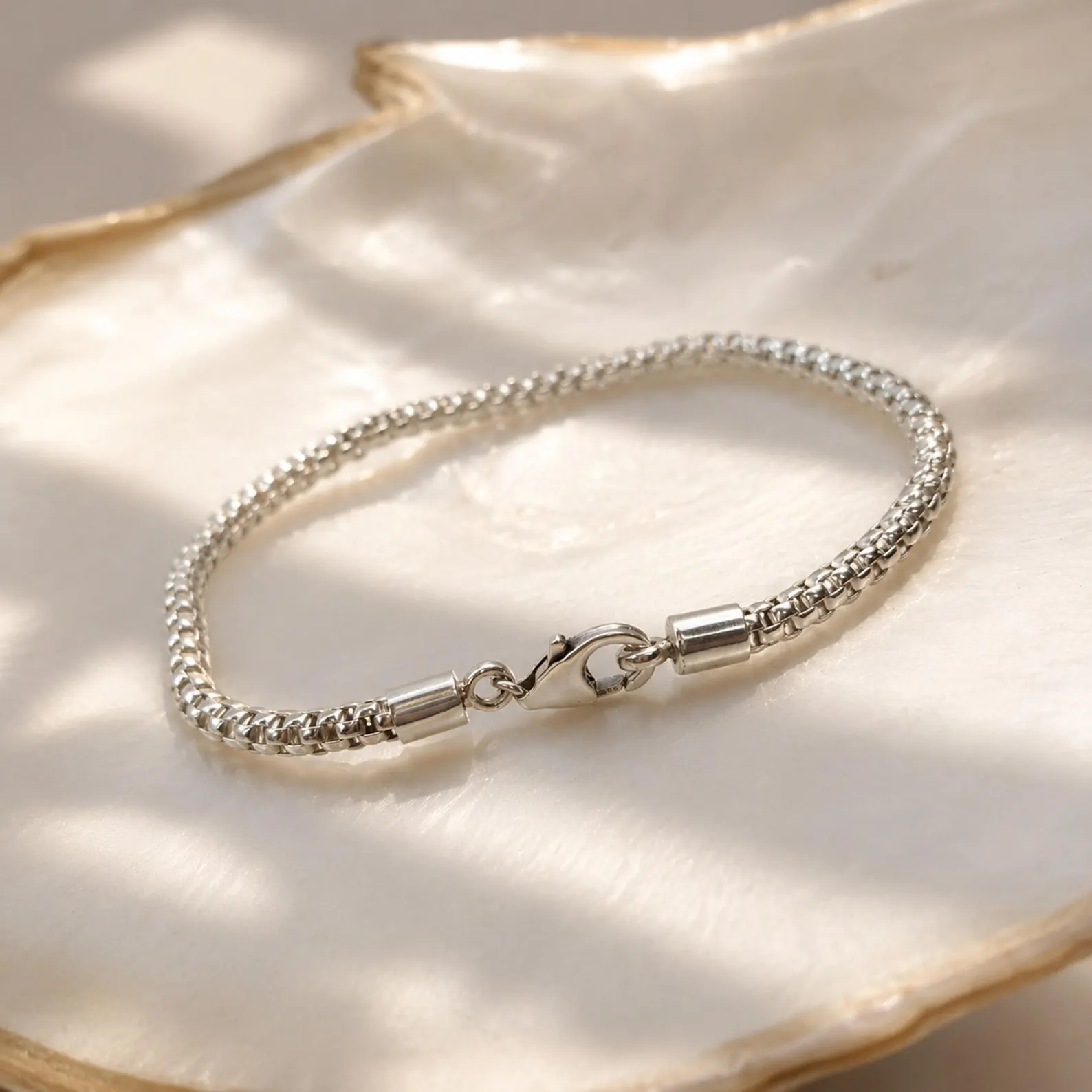 925 Silver Chain Bracelet Studio Shot Minimalist sterling silver bracelet worn on wrist