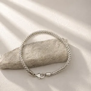 Close-up of elegant silver box chain bracelet detail