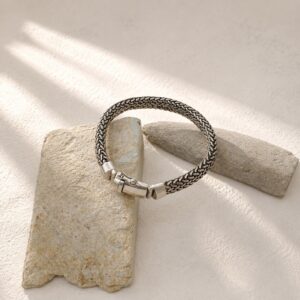 Elegant woven mesh bracelet worn on wrist