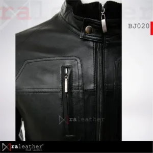 Close-up stitching detail on bomber jacket