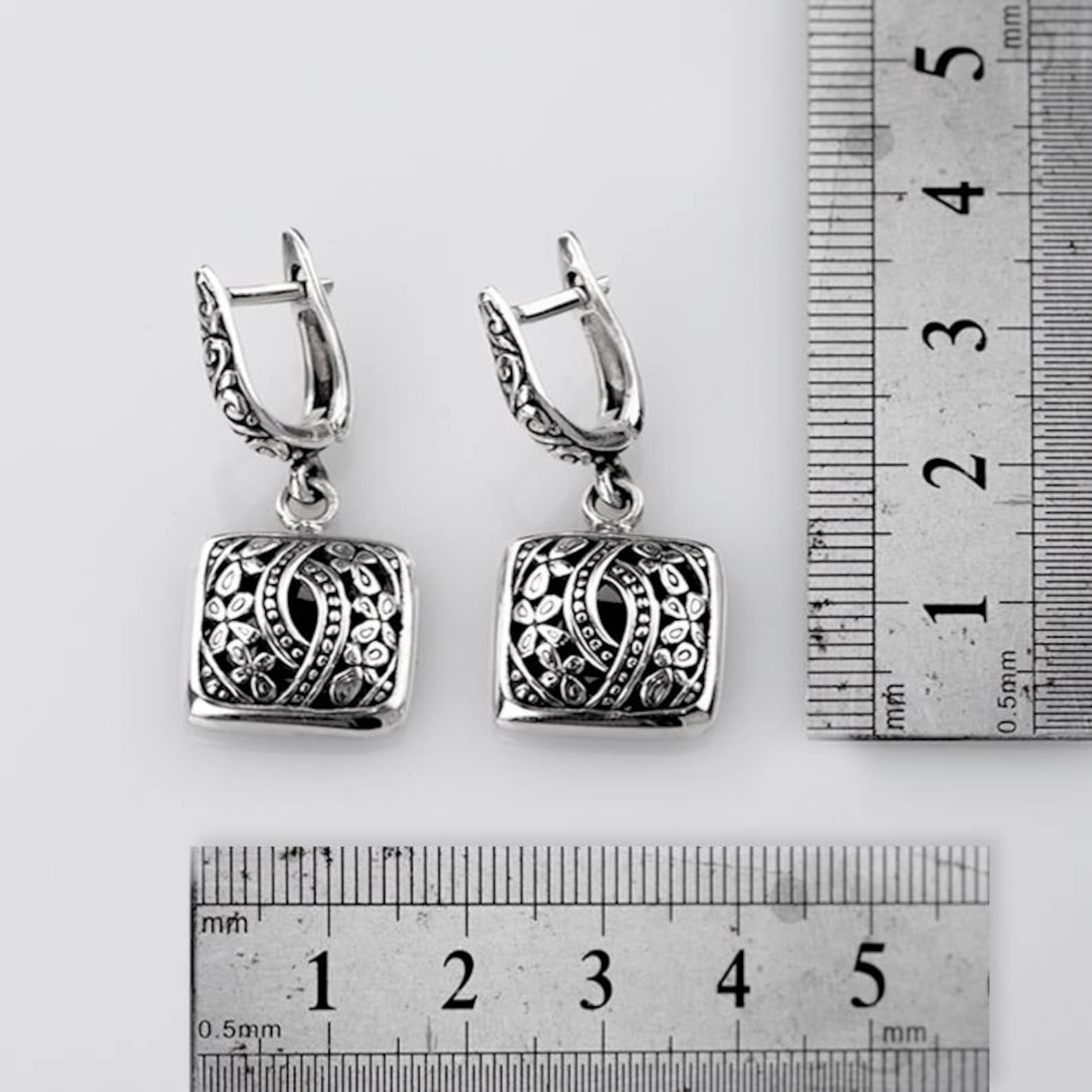 Artisan Bali Silver Earrings Floral Design handmade silver earrings Bali floral design artisan jewelry close up