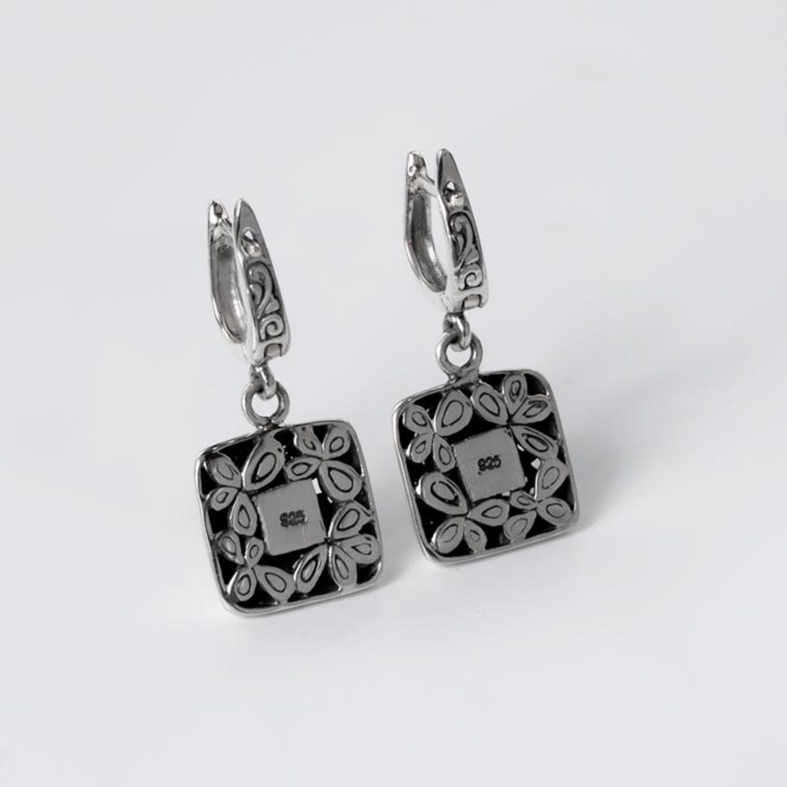 Balinese Handmade Floral Silver Earrings Close Up Detail 925 sterling silver floral engraved earrings lightweight elegant design