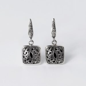 handmade Bali sterling silver earrings floral engraved detail artisan jewelry close up