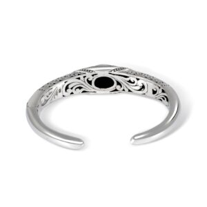 oval turquoise gemstone set in a Balinese sterling silver cuff bracelet