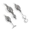 intricate floral scrollwork and toggle clasp on sterling silver bracelet