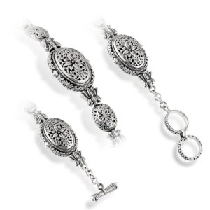 intricate floral scrollwork and toggle clasp on sterling silver bracelet